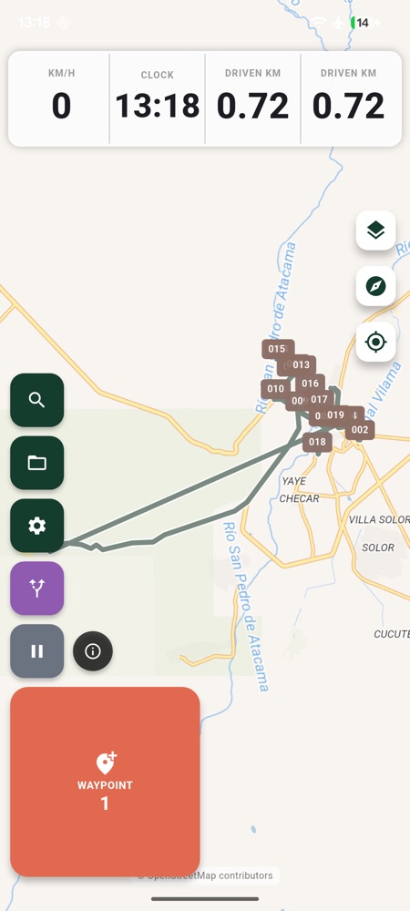 The app recording a track: speed, clock and distance across the top, the route on the map, and the waypoint button